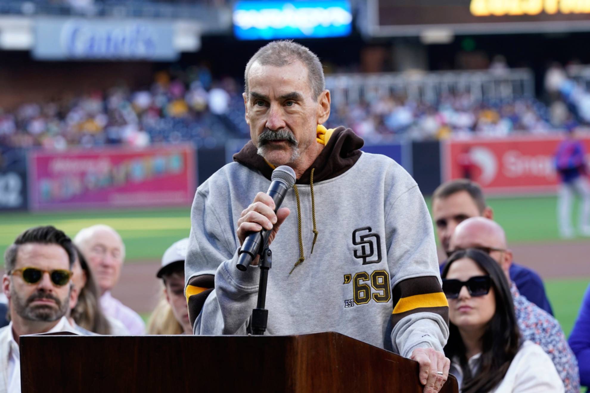 San Diego Padres owner Peter Seidler speaks during induction ceremonies for the Padres Hall of Fame before a baseball game against the Texas Rangers /