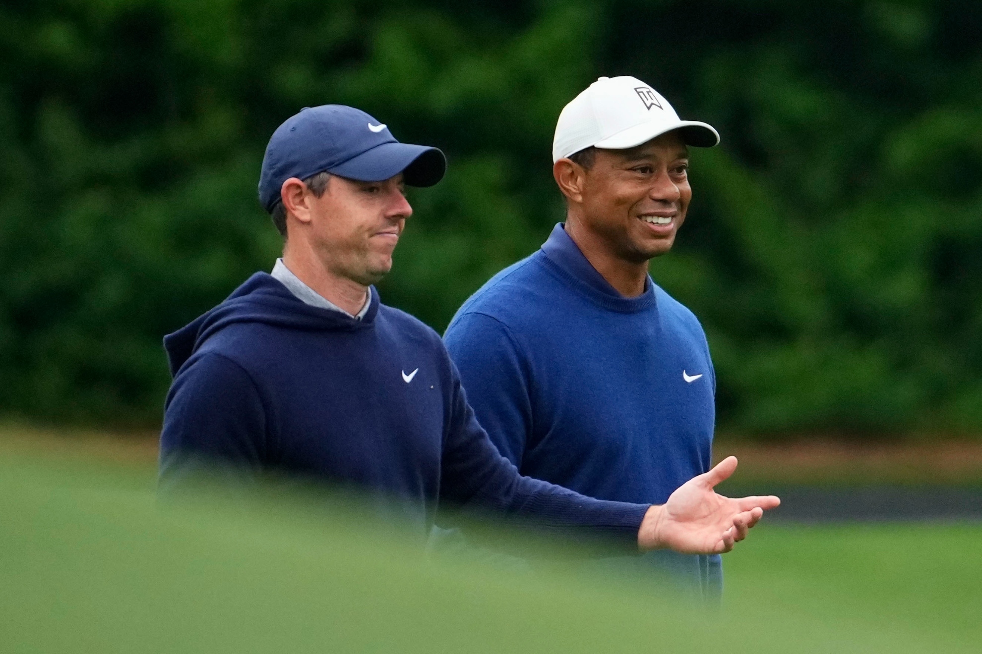 Rory McIlroy and Tiger Woods playing a game